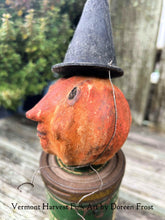 Spun Cotton Pumpkin Folke on antique rusty tins